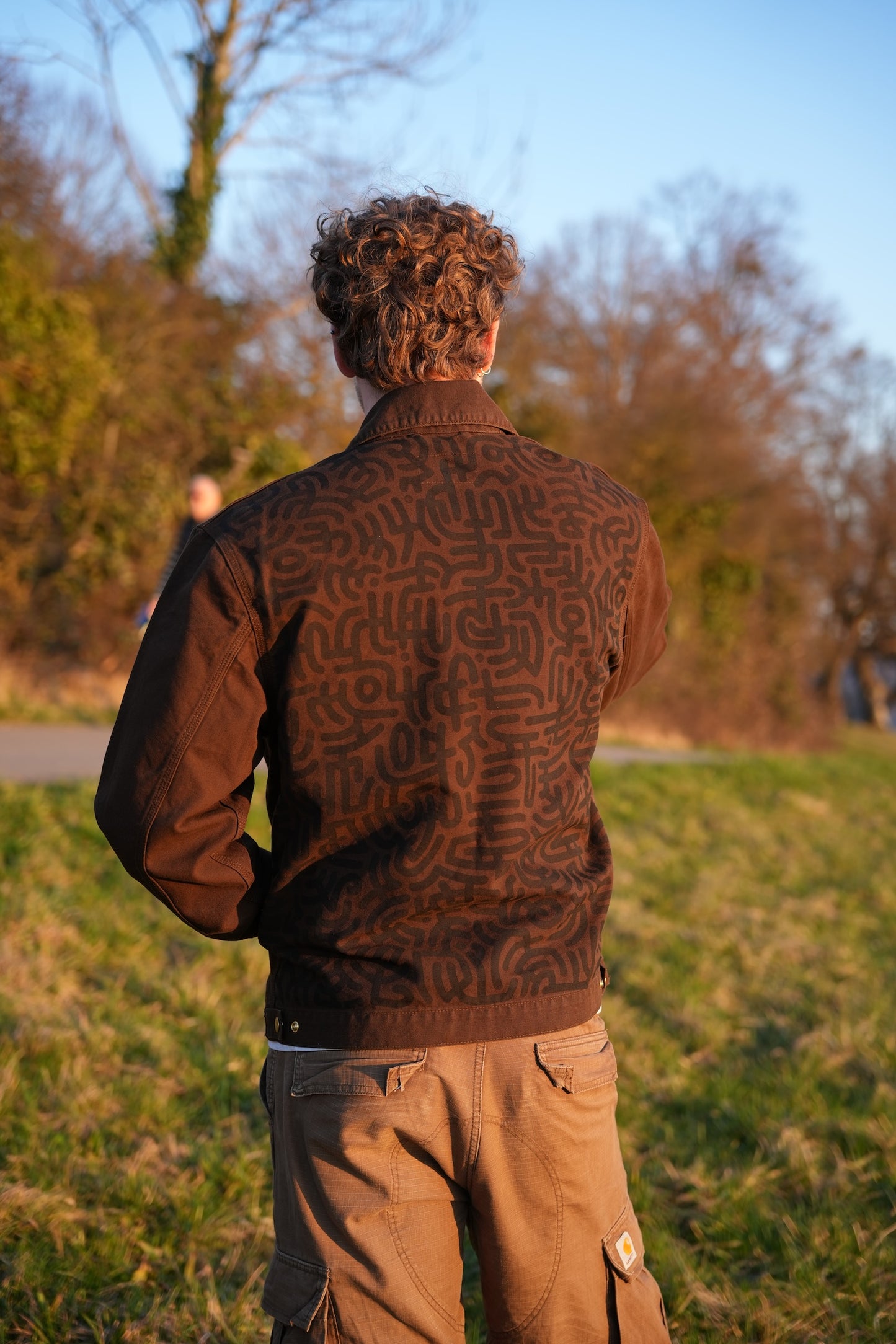 Brown Carhartt Jacket with Black hand-drawn Scripture