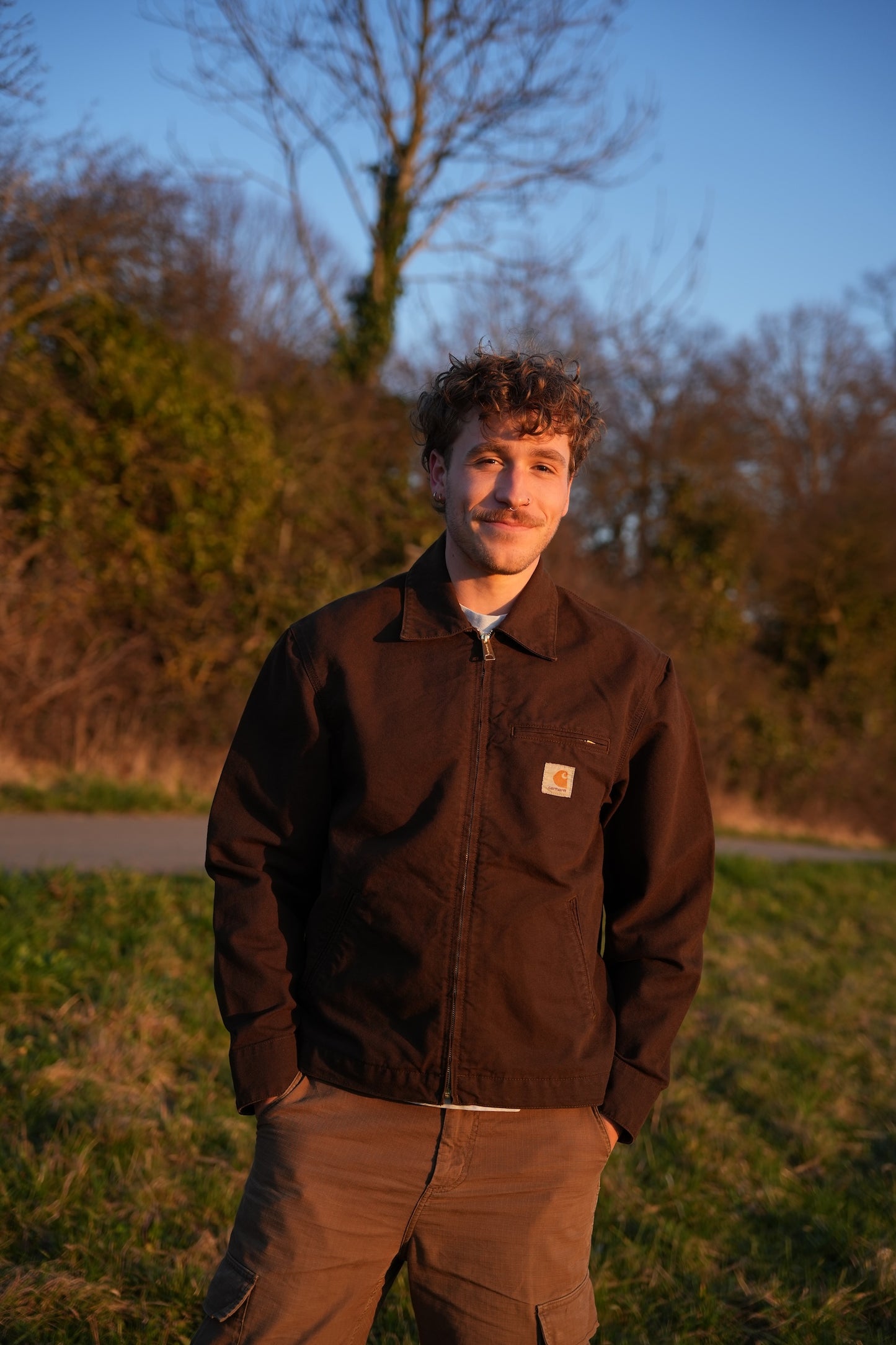 Brown Carhartt Jacket with Black hand-drawn Scripture