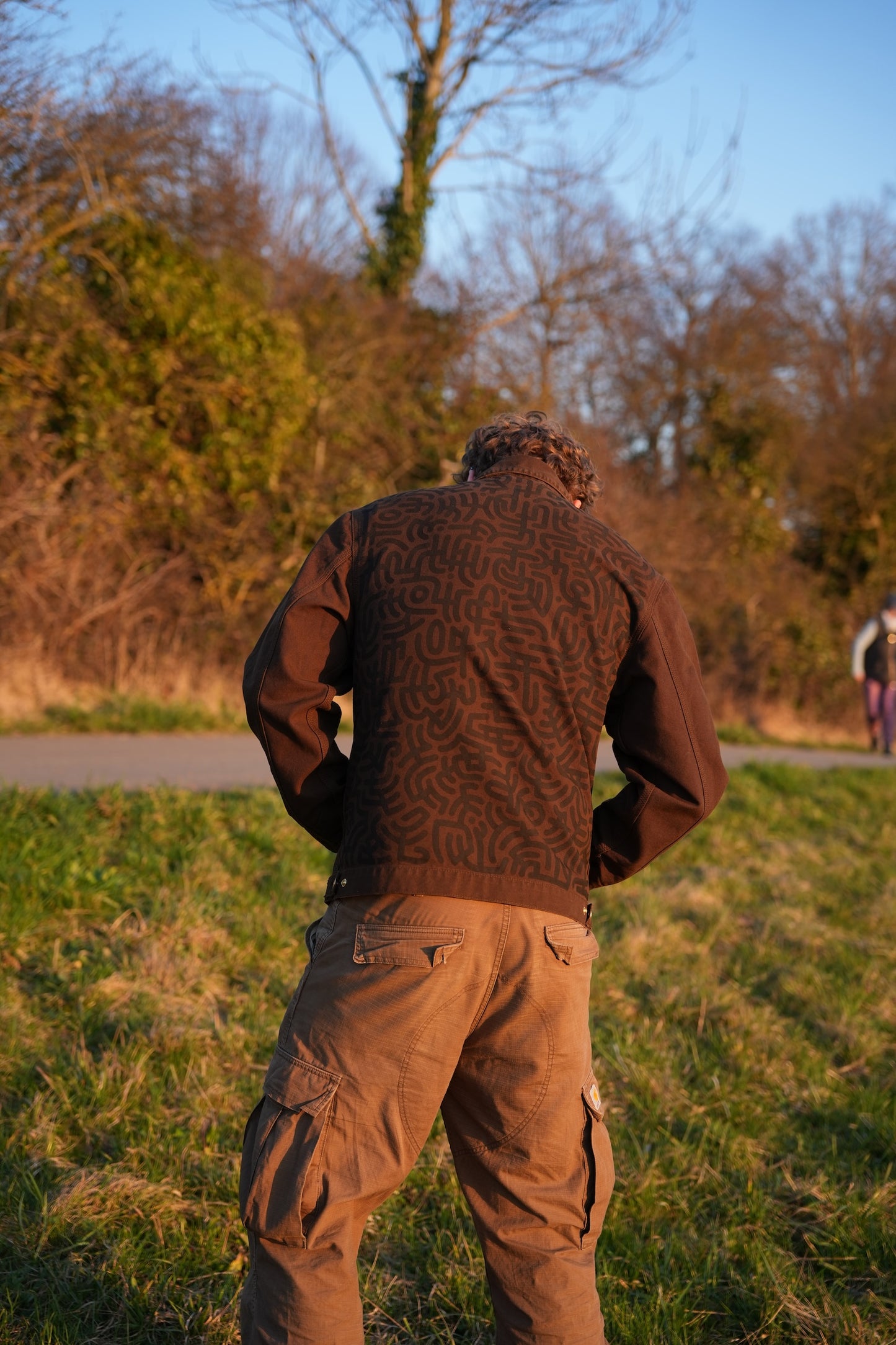 Brown Carhartt Jacket with Black hand-drawn Scripture