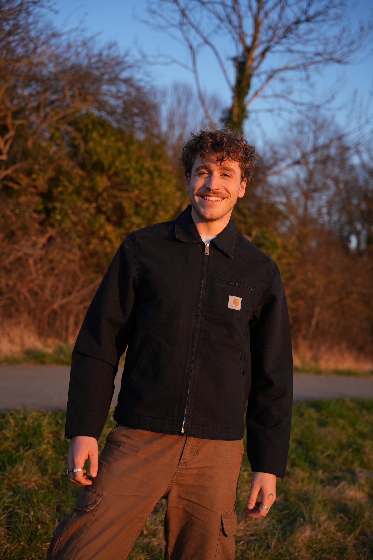Black Carhartt Jacket with White hand-drawn Scripture