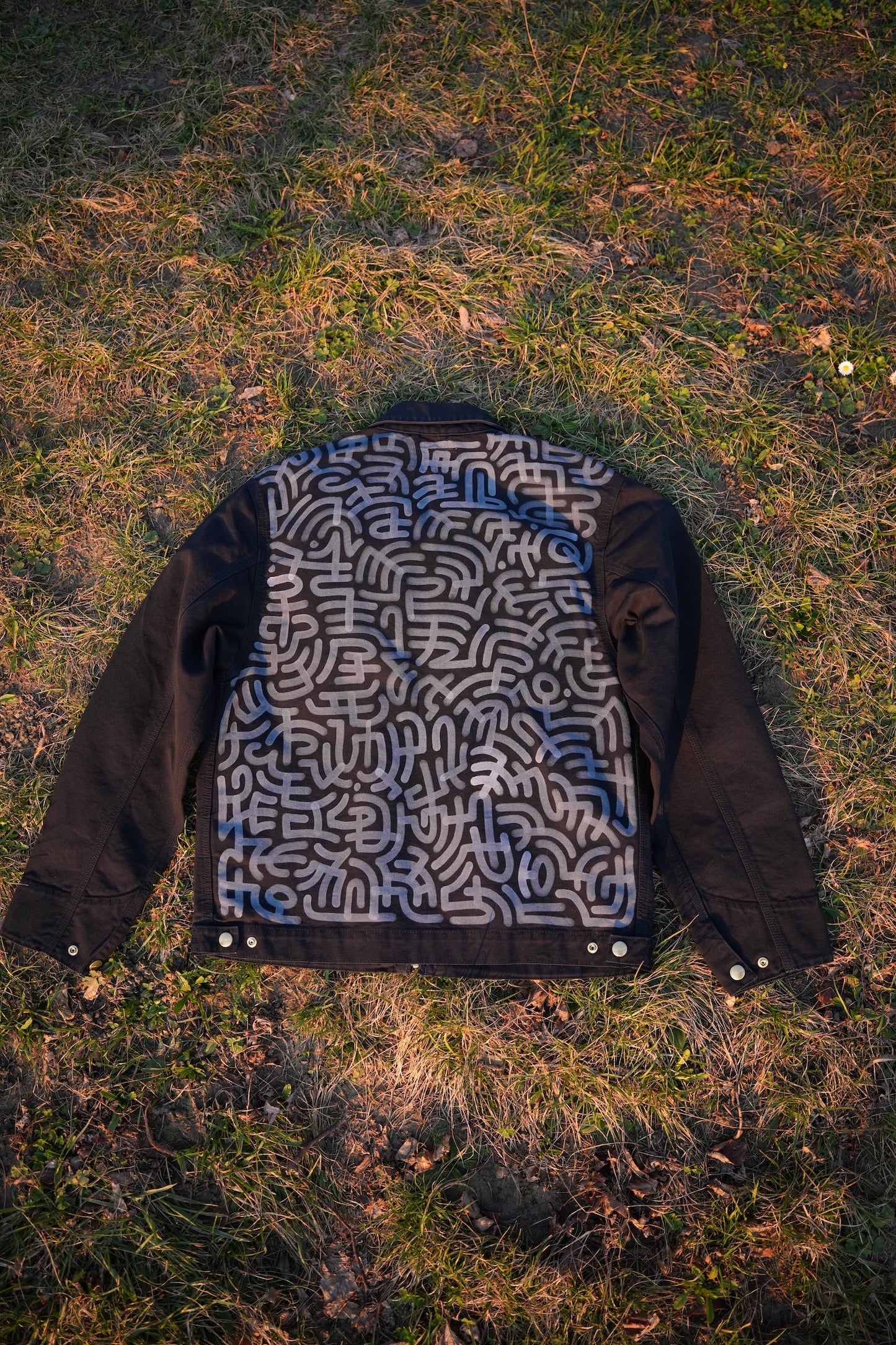 Black Carhartt Jacket with White hand-drawn Scripture